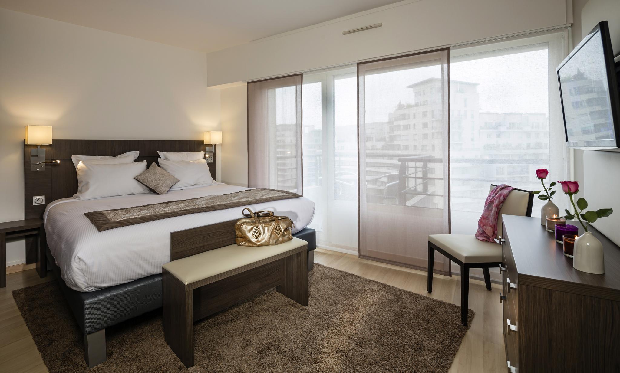 รีซิดโฮม ปาร์ค ดู มิลเลนแนร์ Aparthotel กูร์เบอวัวร์ ภายนอก รูปภาพ
