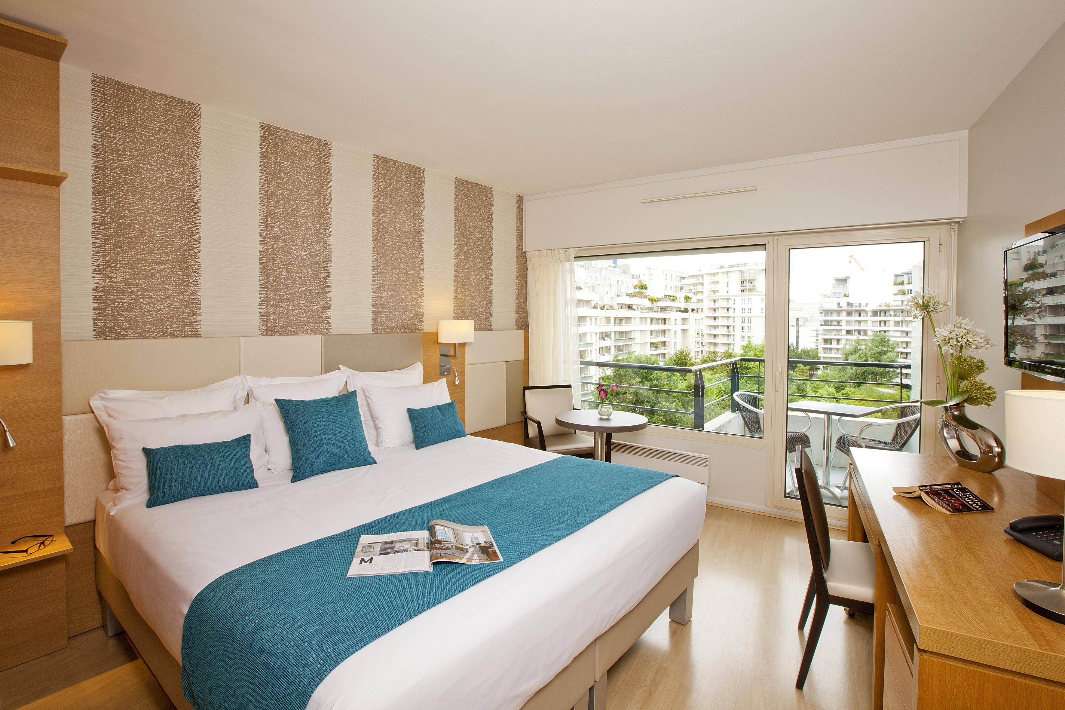 รีซิดโฮม ปาร์ค ดู มิลเลนแนร์ Aparthotel กูร์เบอวัวร์ ภายนอก รูปภาพ