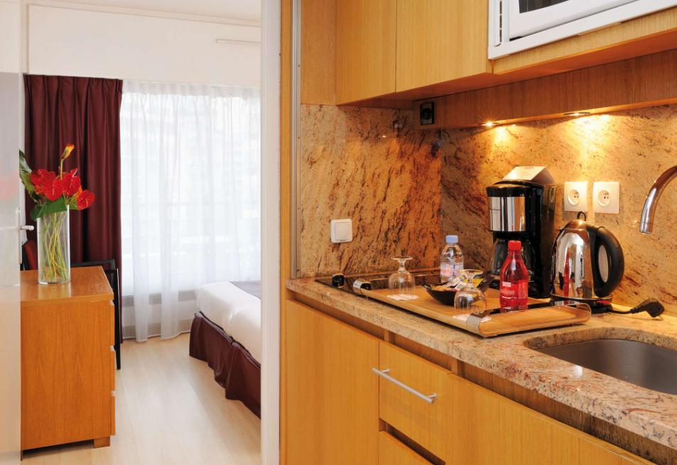 รีซิดโฮม ปาร์ค ดู มิลเลนแนร์ Aparthotel กูร์เบอวัวร์ ภายนอก รูปภาพ