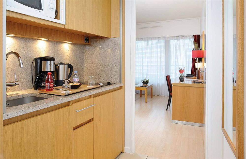 รีซิดโฮม ปาร์ค ดู มิลเลนแนร์ Aparthotel กูร์เบอวัวร์ ภายนอก รูปภาพ