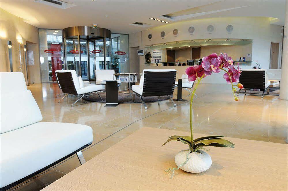 รีซิดโฮม ปาร์ค ดู มิลเลนแนร์ Aparthotel กูร์เบอวัวร์ ภายนอก รูปภาพ